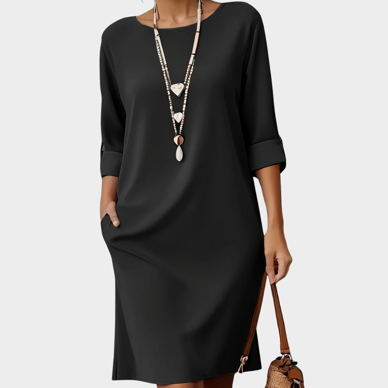 Women's versatile round neck midi dress, ideal for effortless everyday wear and casual spring/summer comfort.