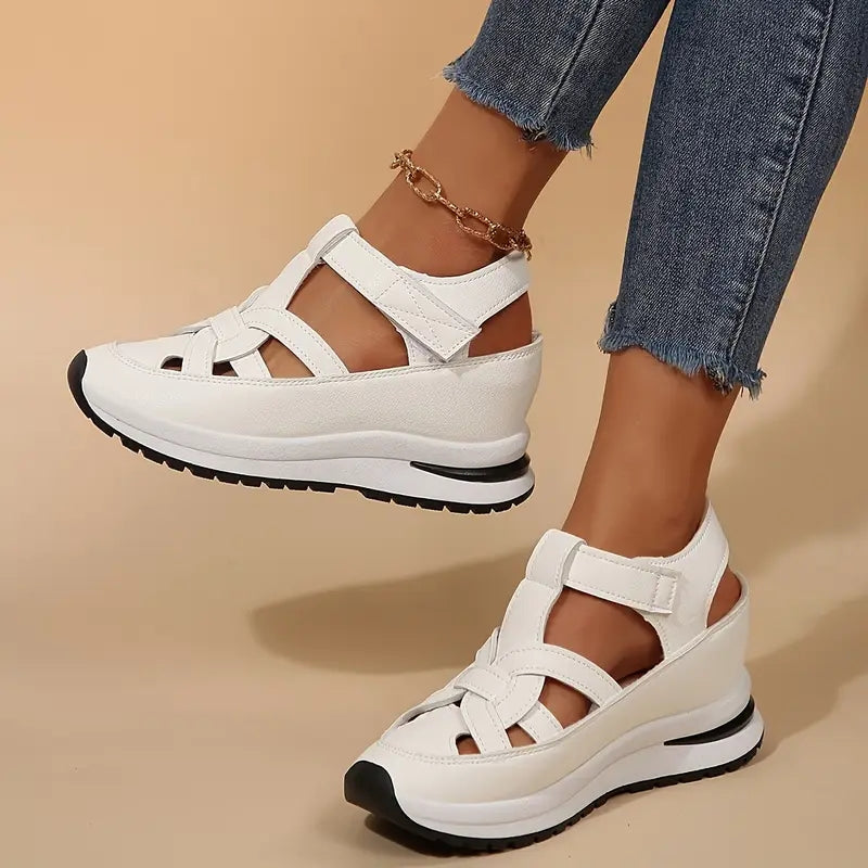 Stylish black women's orthopaedic sandals with arch support, ideal for summer walking & pain relief.