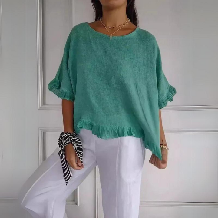 Professional and stylish women's ruffle shirt blouse. Elegant long sleeve top for comfortable versatile fashion.