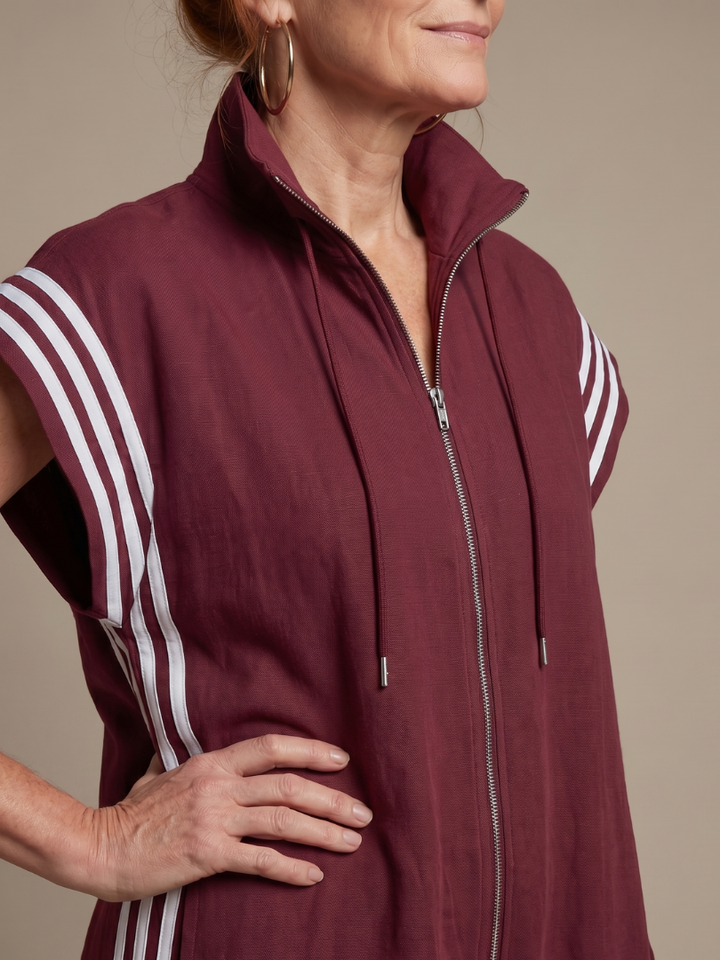Comfortable high neckline zip front jumpsuit for women, featuring elegant stripe panels.