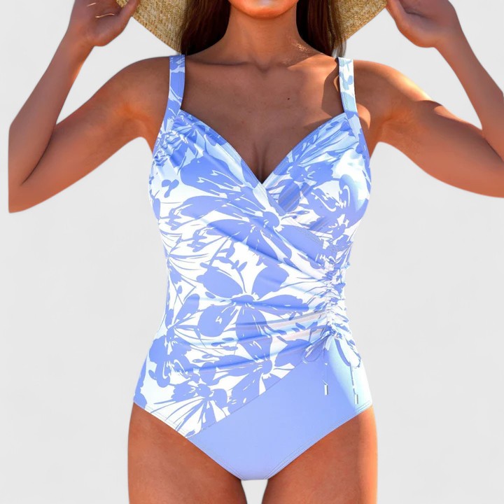 Flattering women's printed one-piece swimsuit, ideal for stylish beach days, pool parties & tropical getaways.