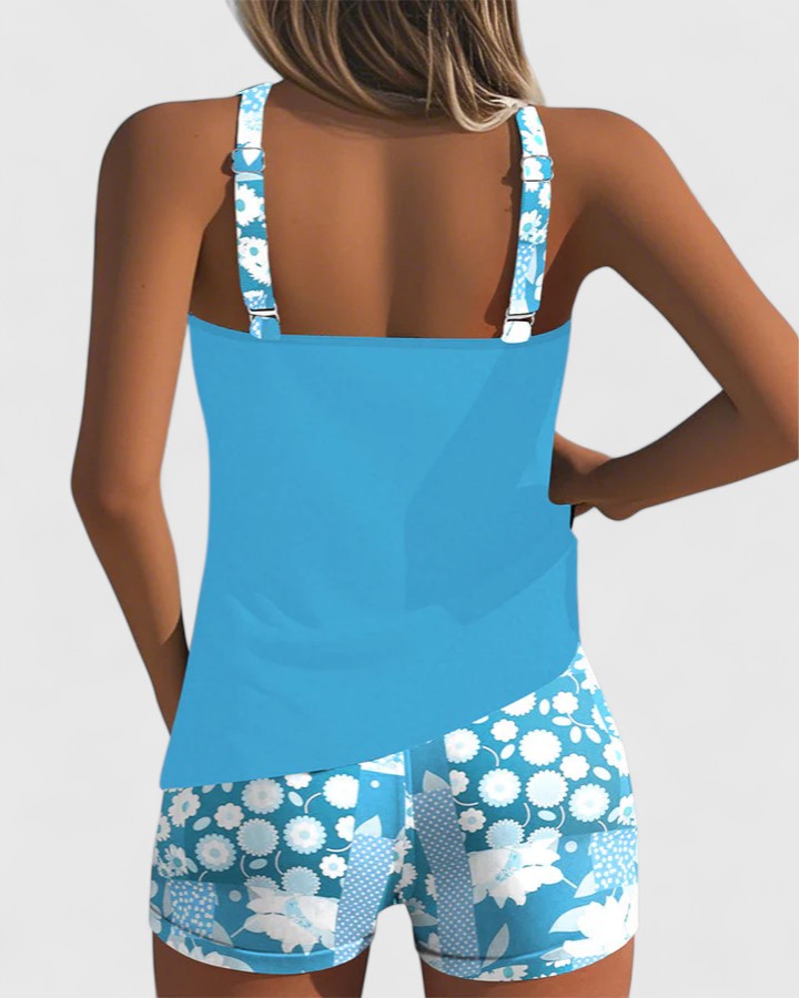 Women's vibrant floral tankini set. Stylish and comfortable swimwear for summer and vacation.