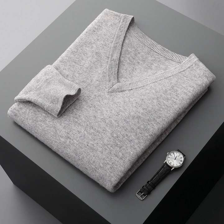 Essential men's V-neck knit sweater, a classic long sleeve piece for modern casual menswear.