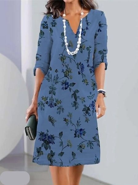 Stylish women's floral A-line midi dress, round neck, versatile for elegant or casual wear.