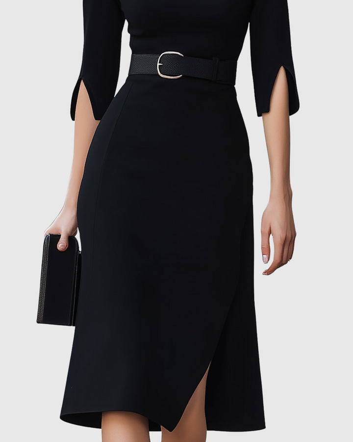 Classic black midi dress, an essential womenswear piece for formal occasions, evening events, and elegant fashion.