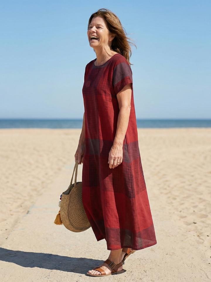 Comfortable women's burgundy plaid midi dress with a relaxed fit and short sleeves for effortless casual style.