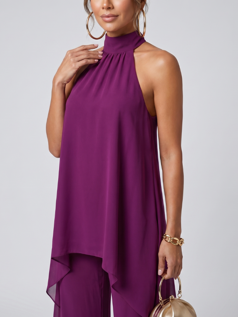 Relaxed fit women's purple asymmetric tunic with wide leg pants. Stylish two-piece coordinated summer outfit.