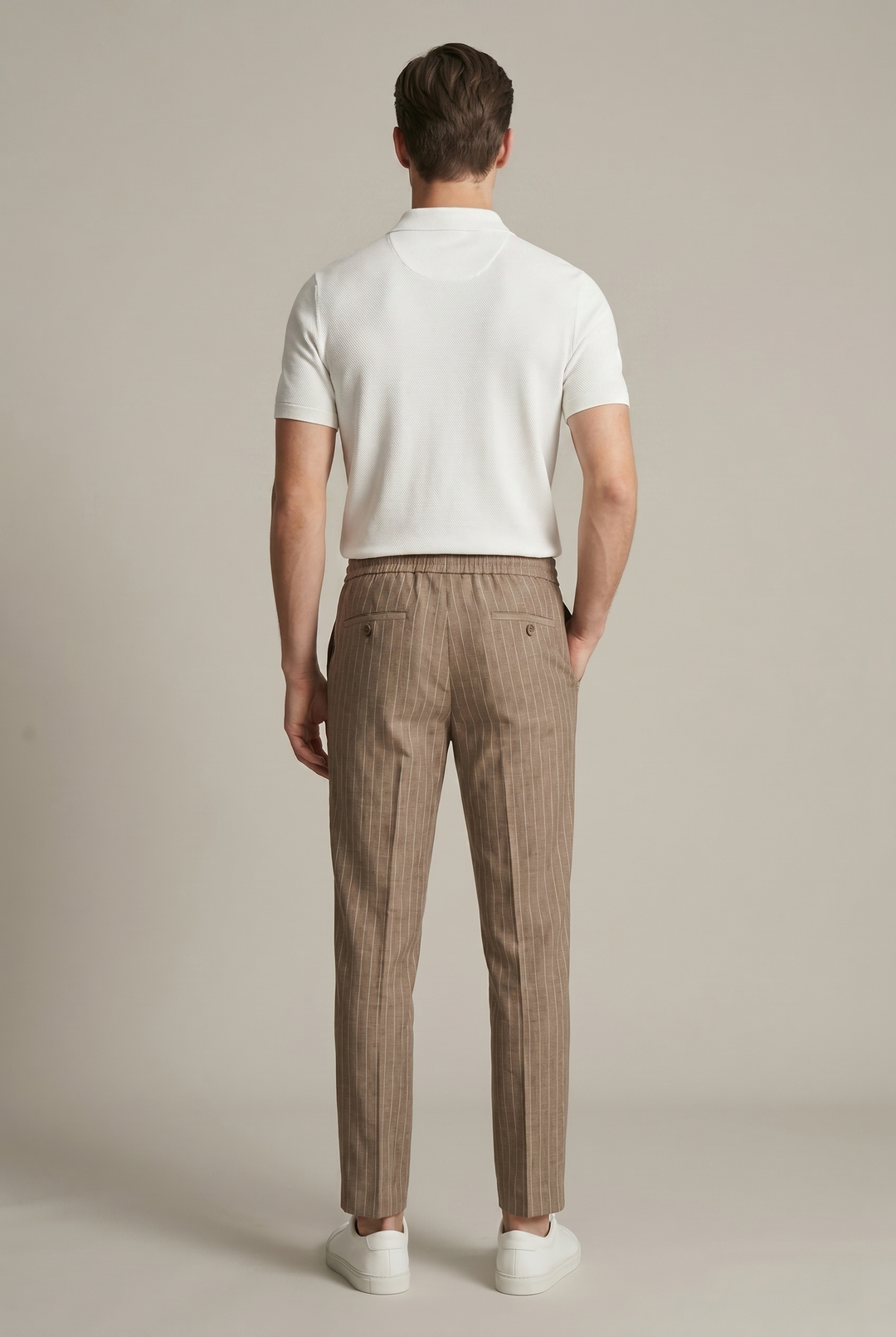 Comfortable blue men's pinstripe tapered trousers, smart casual elastic waist pants, ideal for versatile styling.