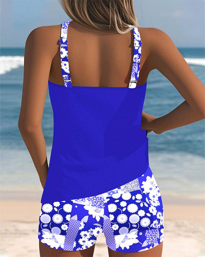 Women's colorful printed swimsuit set, including a chic tank top and comfortable matching shorts.