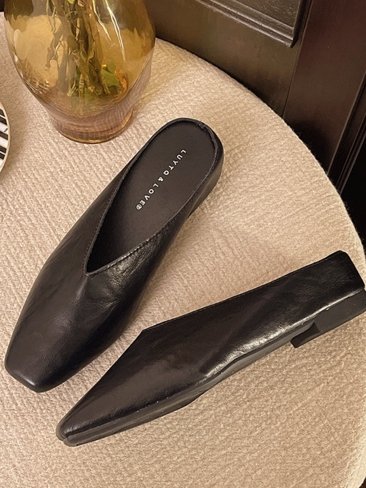 Modern women's flat slip-on shoes, versatile for everyday wear, offering comfort and effortless style.