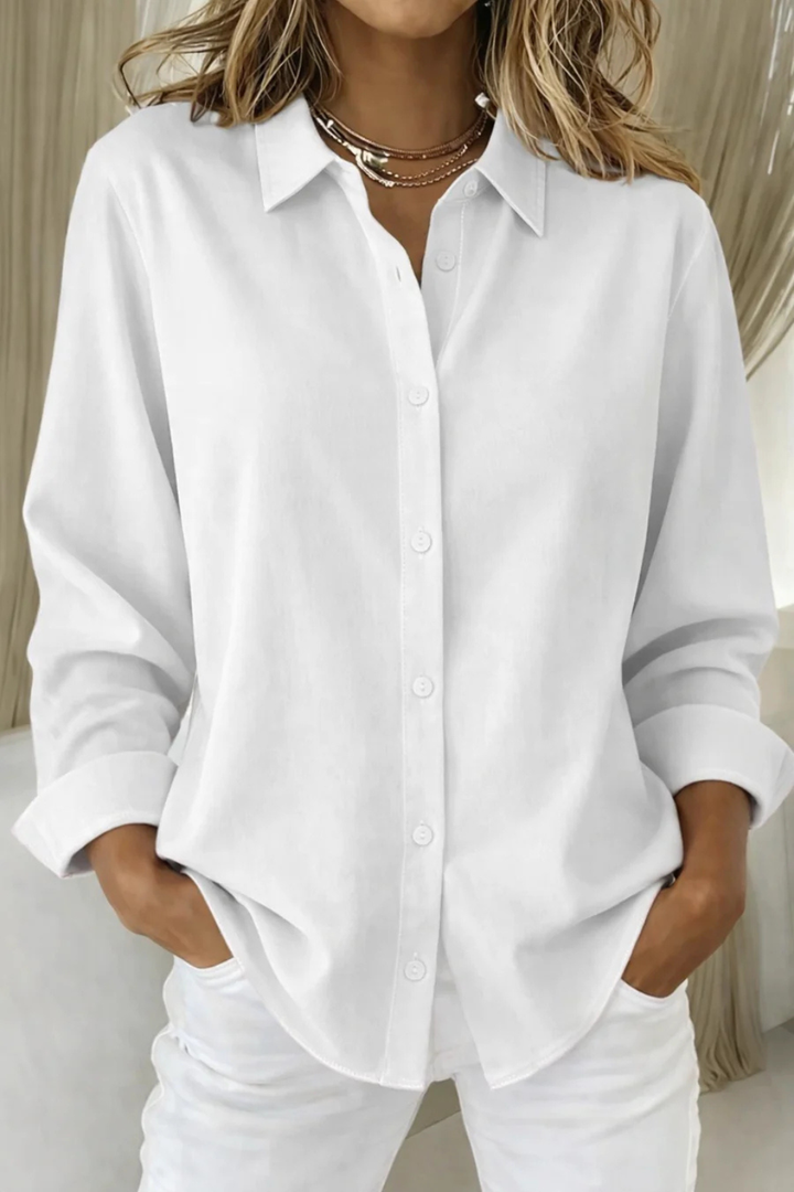Modern women's relaxed fit collared button down shirt, long sleeves, perfect for elegant and daily looks.