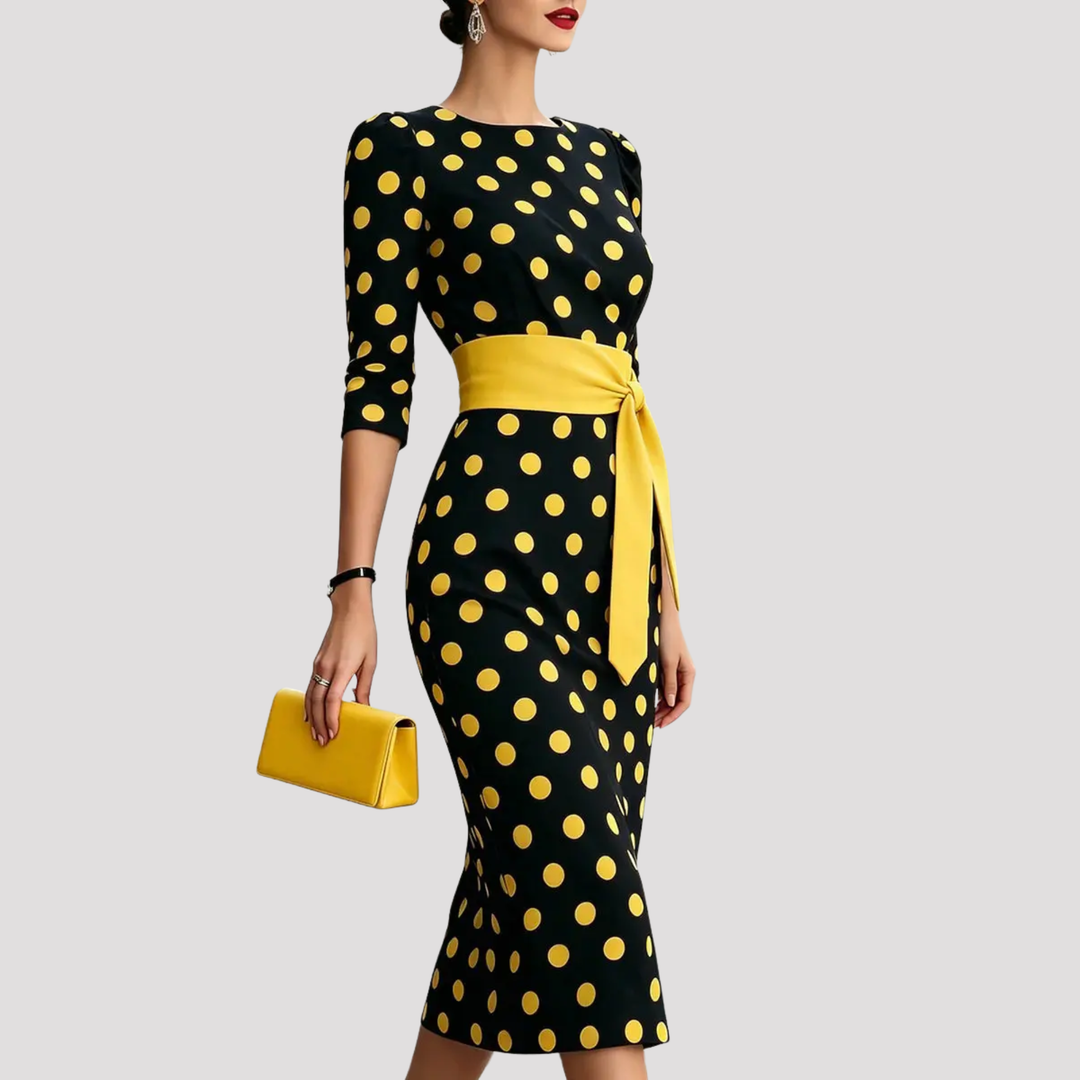 Sophisticated women's belted polka dot midi dress, a classic and elegant choice for any party or event.