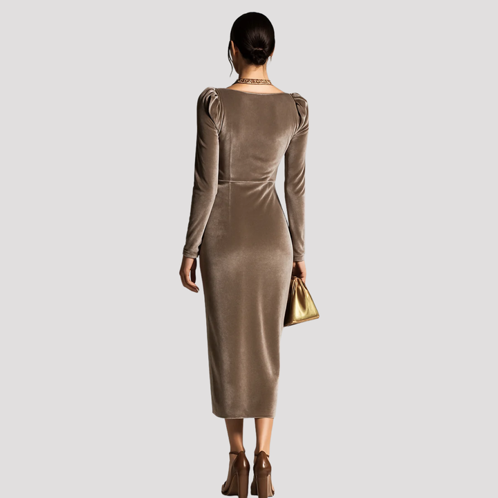 Chic women's ruched midi dress with asymmetric hem. Elegant long sleeve design for evening events & parties.