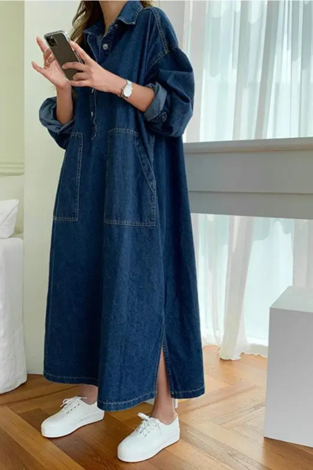 Stylish women's long sleeve maxi dress featuring an oversized fit, classic collar & convenient pockets.