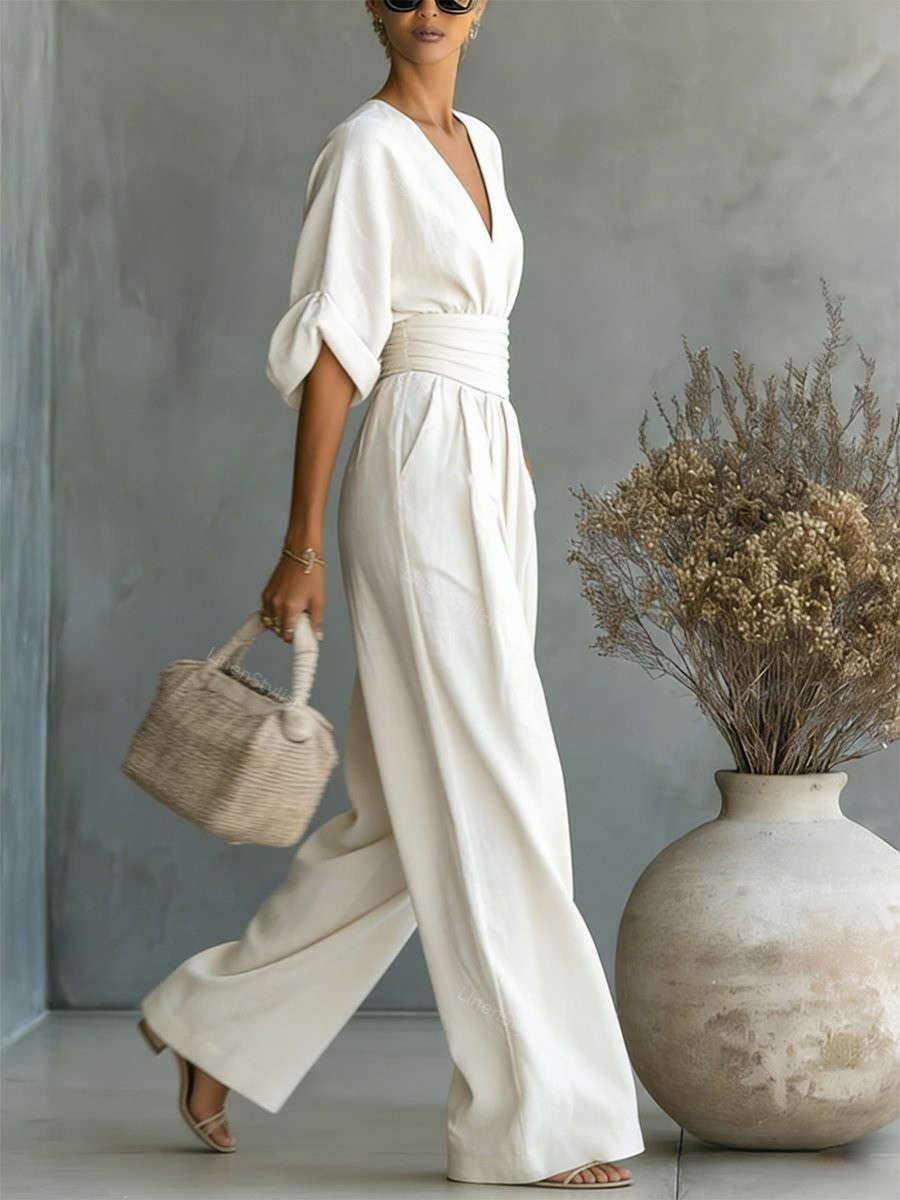 Fashionable V-neck jumpsuit for women, offering elegant workwear & comfortable casual style.
