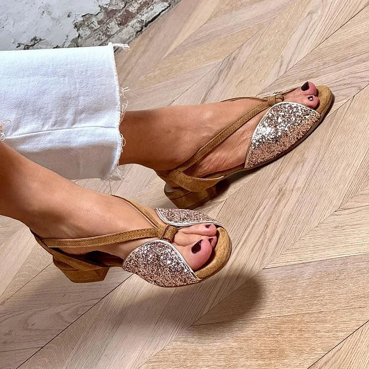 Stylish women's low heel brown strappy sandals featuring delicate glitter, great for versatile summer casual or elegant wear.