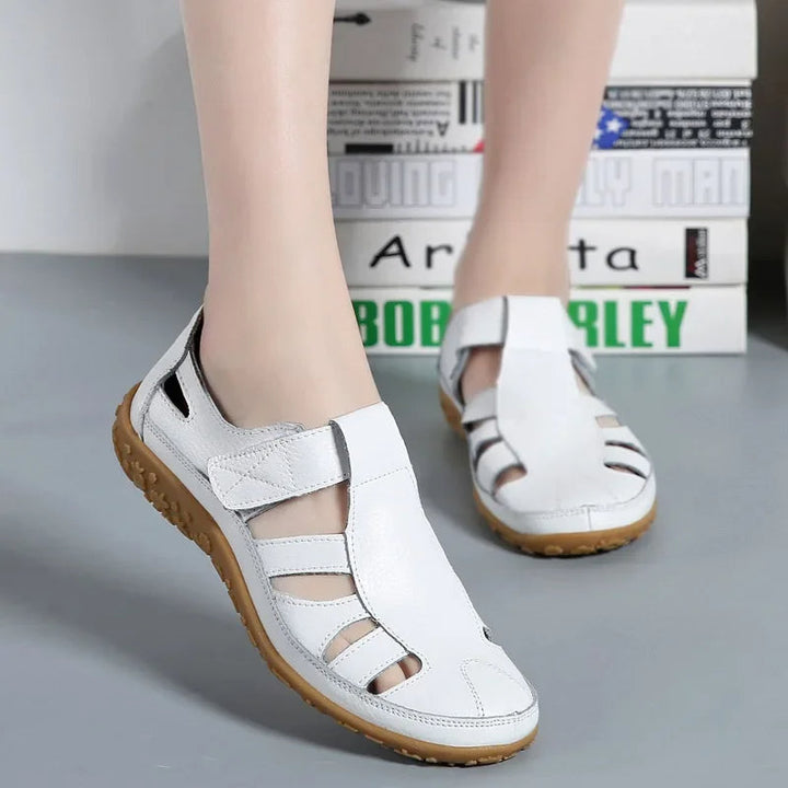 Premium brown leather women's open-toe sandals with adjustable velcro for ultimate comfort & breathability.