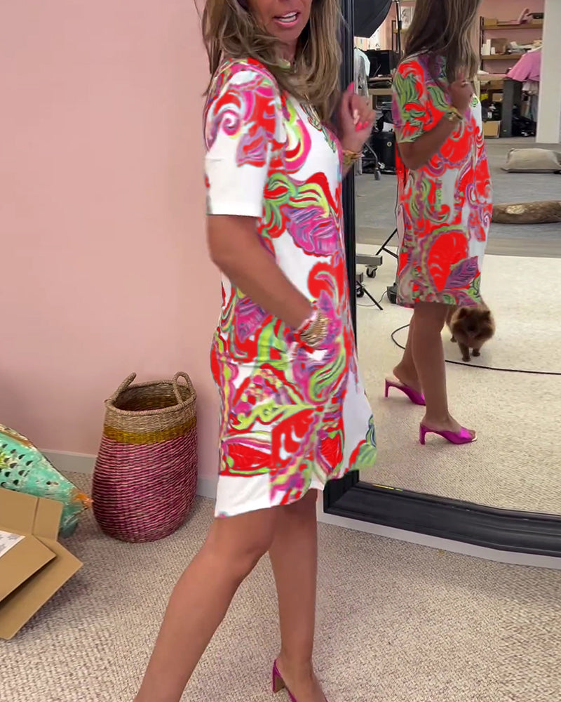 Relaxed fit women's Nadia midi dress with a beautiful floral print, great for summer comfort.