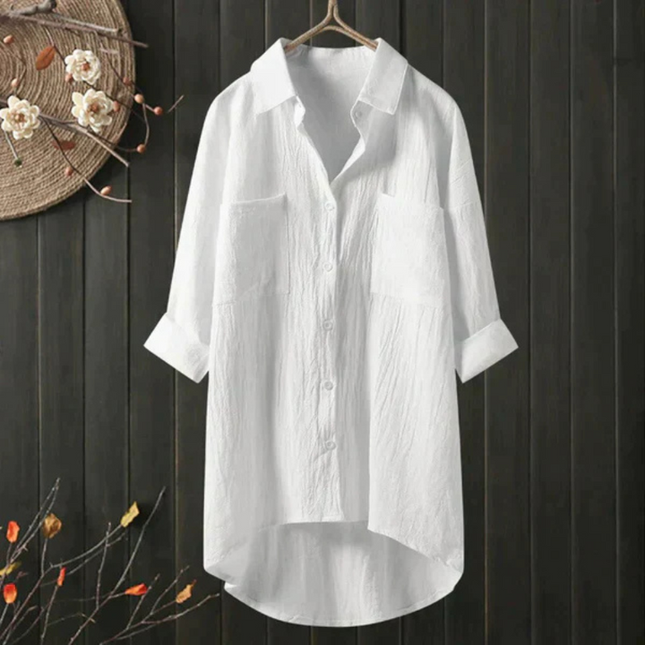 Elegant yet casual women's oversized blouse, offering effortless comfort & versatile daily fashion.