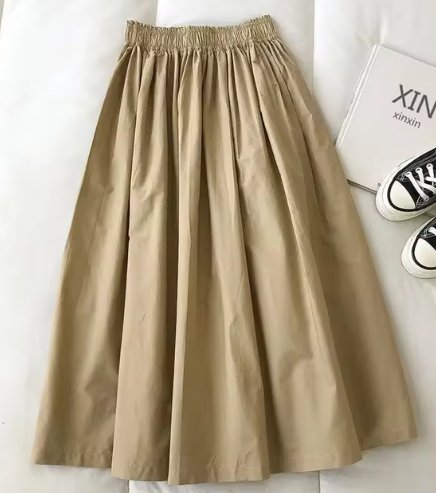 Versatile high-waist women's midi skirt with single-breasted detail, ideal for all-season elegant style.