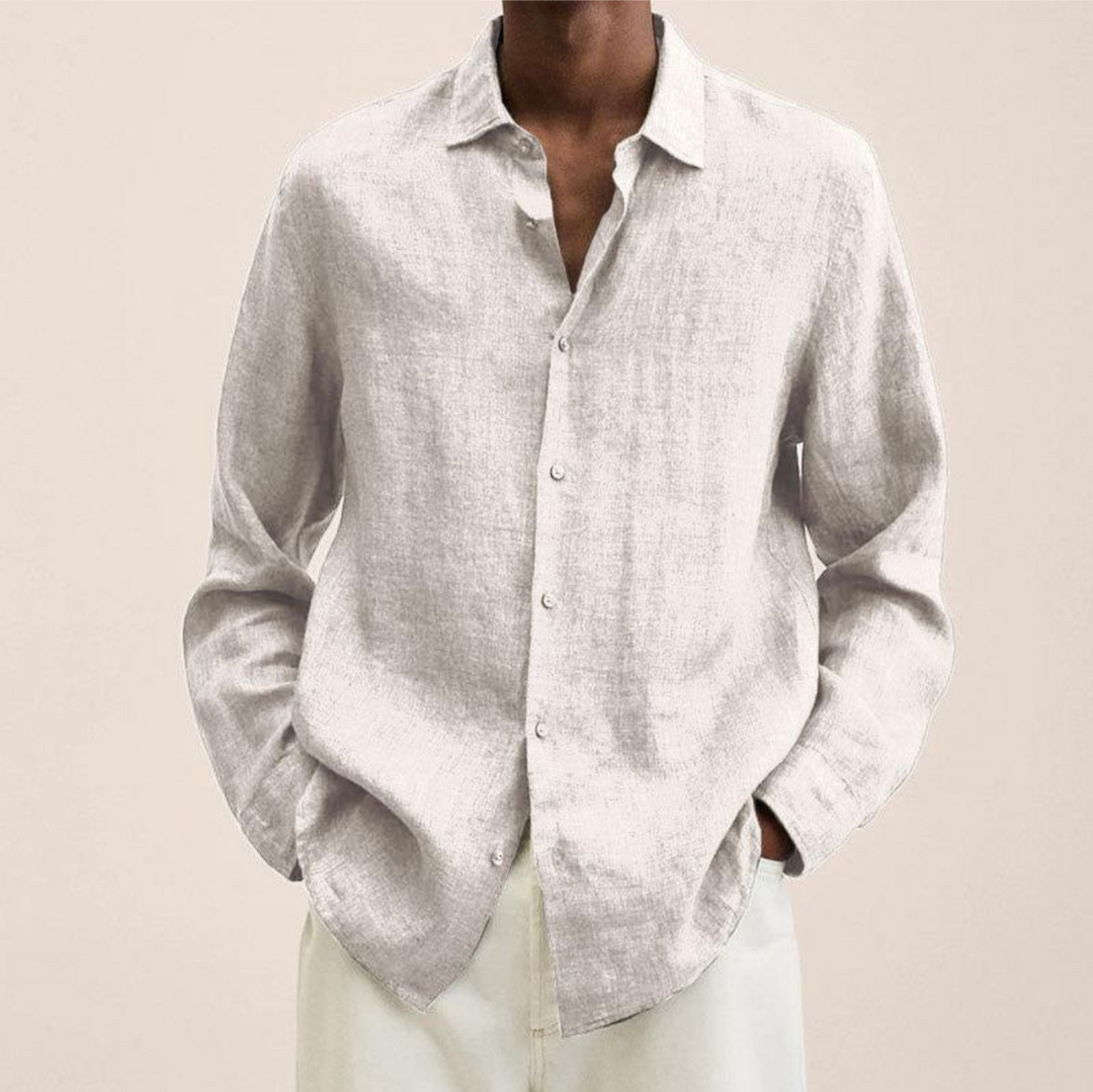 Blue men's long-sleeve button-up shirt, a versatile everyday top for modern menswear fashion.