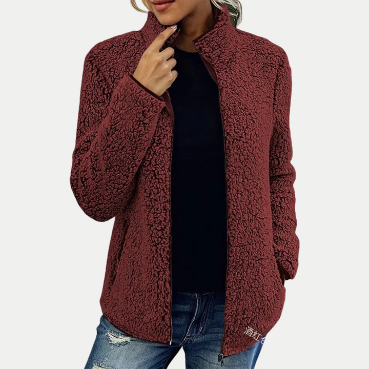 Stylish women's textured zip-up fleece jacket, high collar, long sleeves. Versatile outerwear for women's casual fashion.