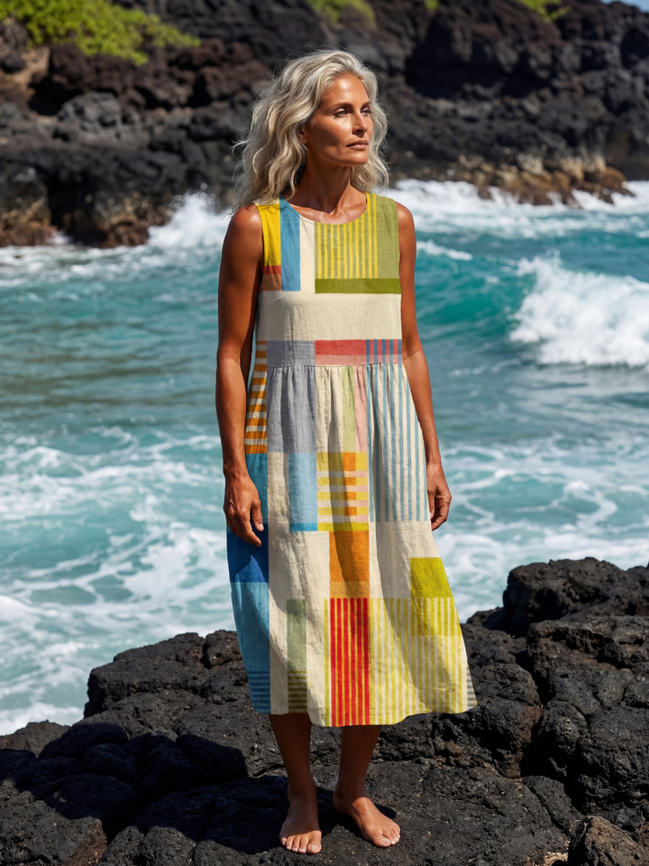 Women's multi-color painted block print midi dress. Sleeveless, relaxed fit, comfortable for summer casual wear.