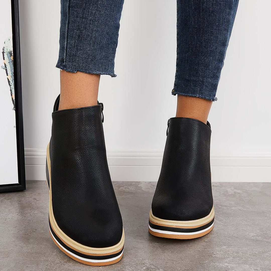 Women's orthopedic ankle boots with side zipper, offering stylish comfort & support.