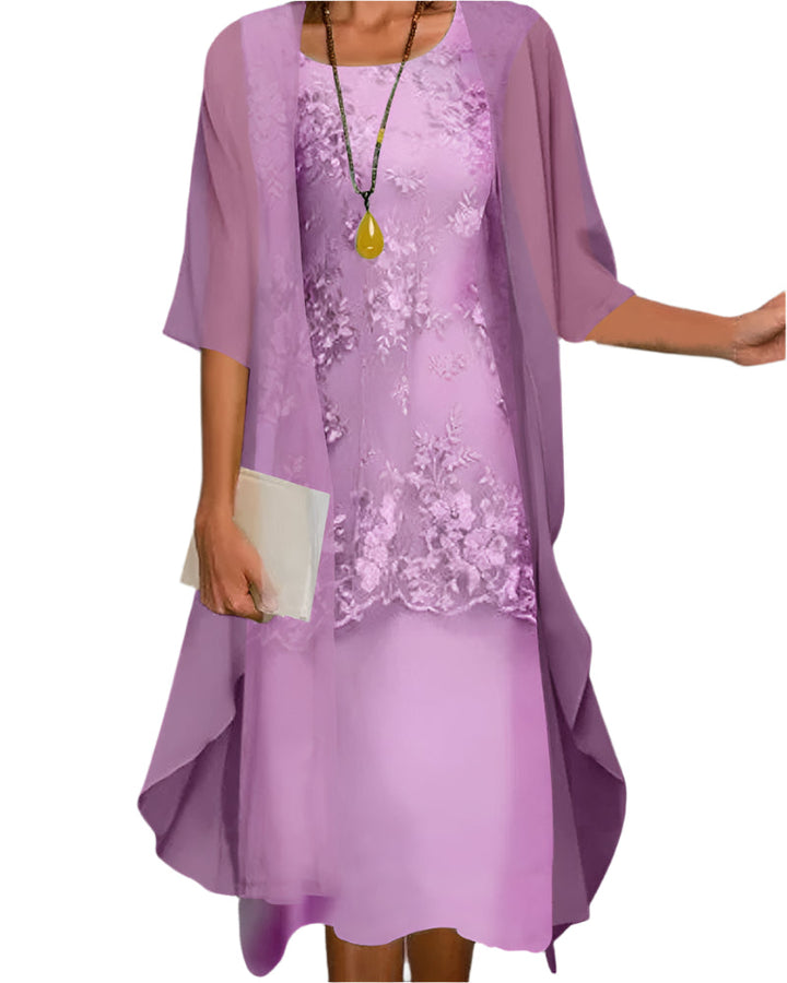 Beautiful women's formal midi dress for wedding guests. Features elegant flowing design & stylish sheer sleeves.