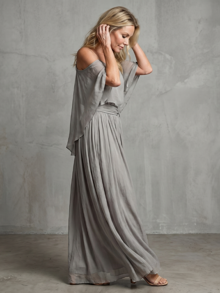 Comfortable women's grey cold shoulder top & wide leg pant set. Relaxed fit, layered drape design for casual chic.
