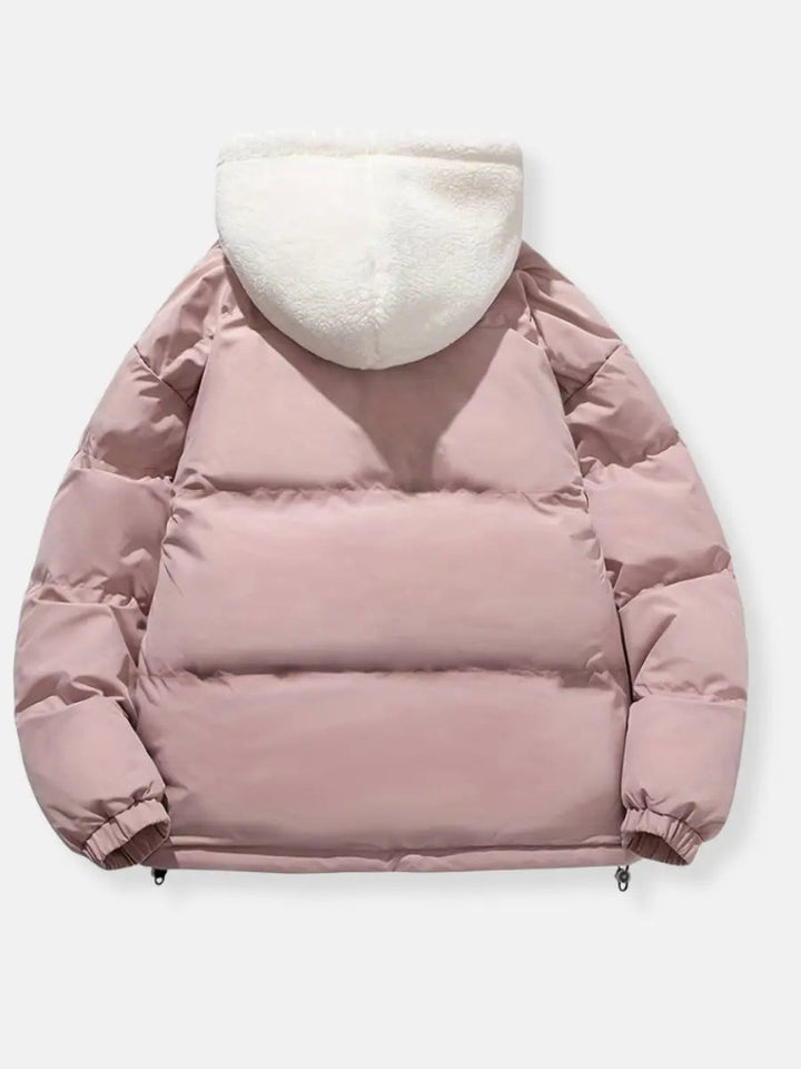 Green luxury women's puffer coat with a plush hood, designed for warmth & ladies' fashion.