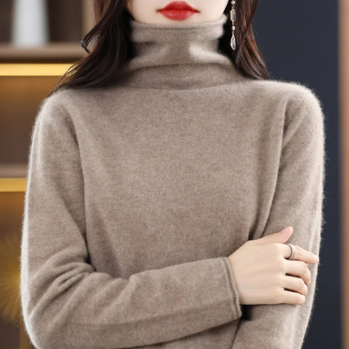Elegant women's roll neck sweater. Plush, soft fabric, ideal for autumn & winter fashion.
