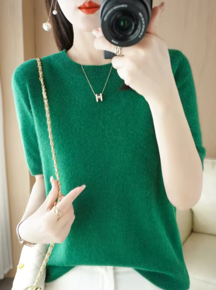Women's chic short-sleeve knit top. Modern, elegant, and cozy for everyday versatile style.