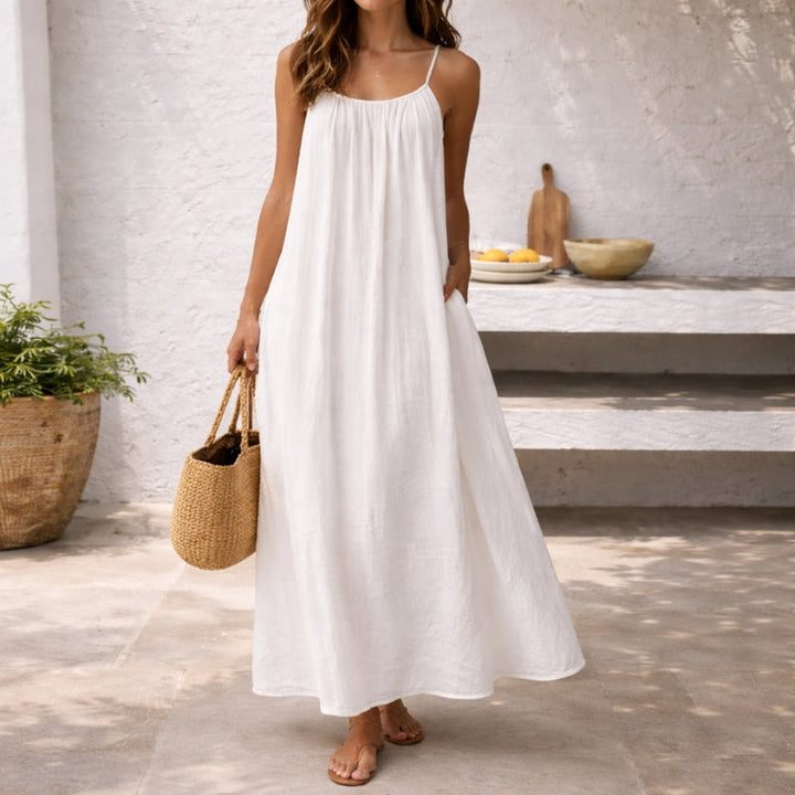 Stylish women's spaghetti strap maxi dress. Ideal for summer casual or dressy occasions.