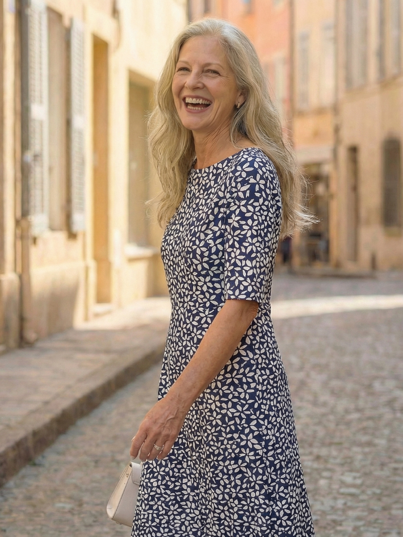 Relaxed fit blue midi dress for women featuring a coastal pattern and three-quarter sleeves, perfect for everyday summer style.