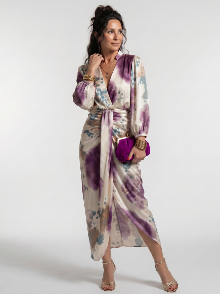 Versatile women's printed midi dress with cross wrap and tie waist, ideal for elegant day or evening wear.