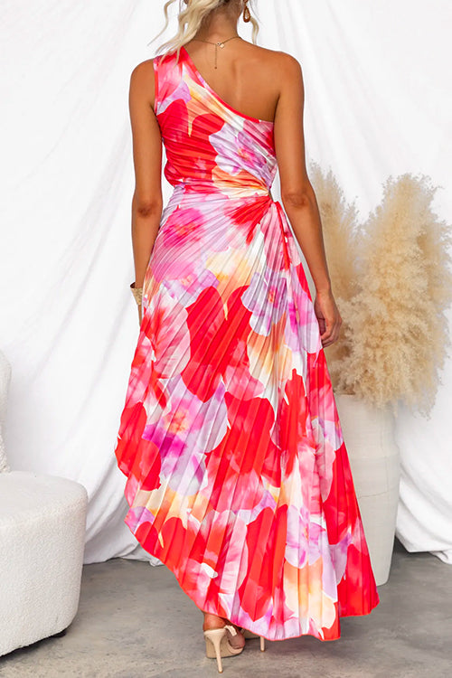 Red one-shoulder pleated maxi dress for women, featuring an asymmetric hem. Ideal for elegant occasion wear.