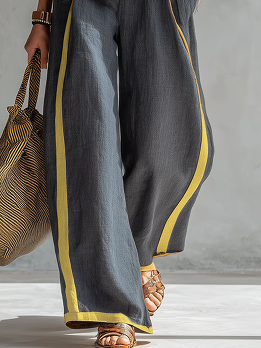 Elegant sleeveless top and flowy wide leg trousers. A stylish two-piece women's set, perfect for everyday chic.