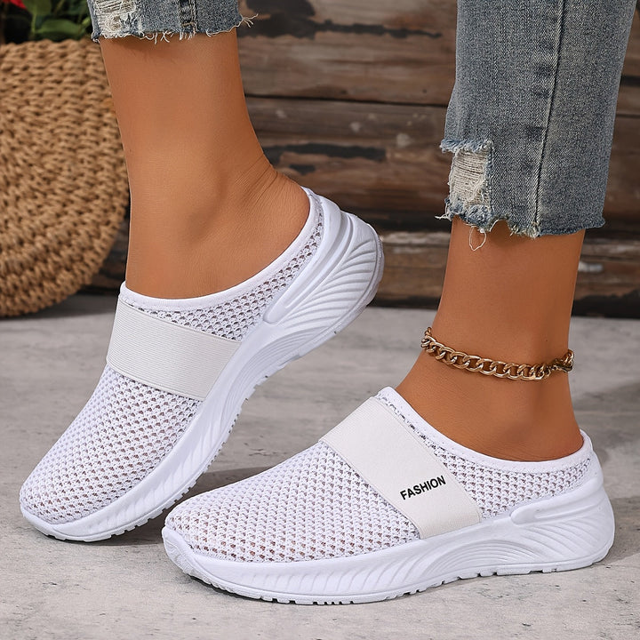 Women's casual slip-on sneakers with breathable mesh, perfect for everyday summer style.