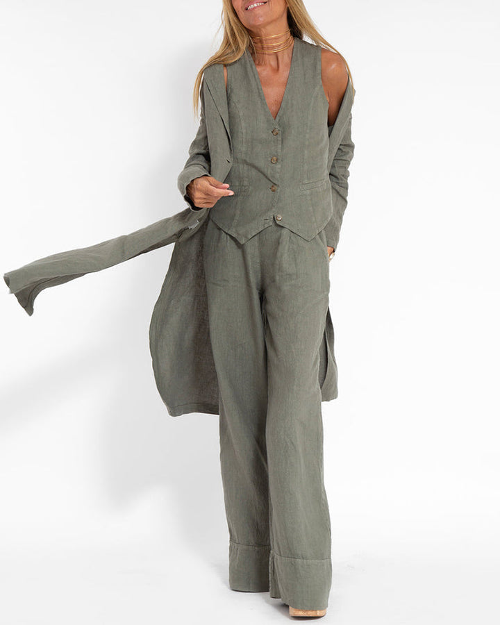 Close-up of fabric detail on a women's two-piece wide leg pants and vest set, elegant design.
