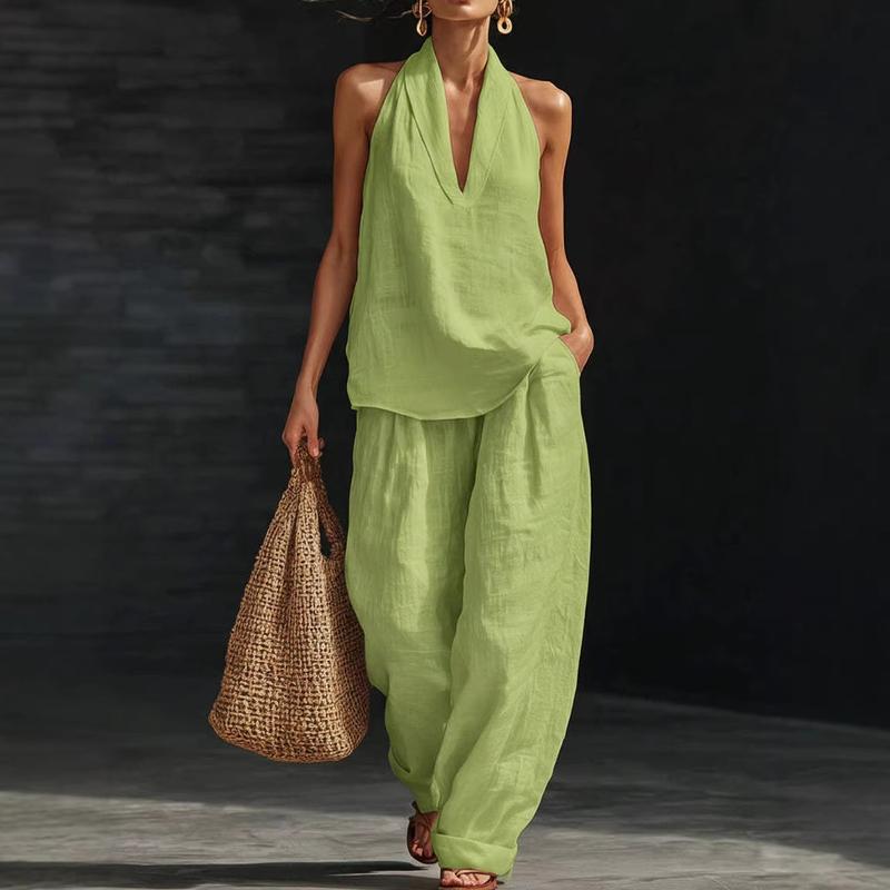 Versatile women's two-piece set in linen blend. Casual batwing top and wide-leg pants, perfect for resort wear.