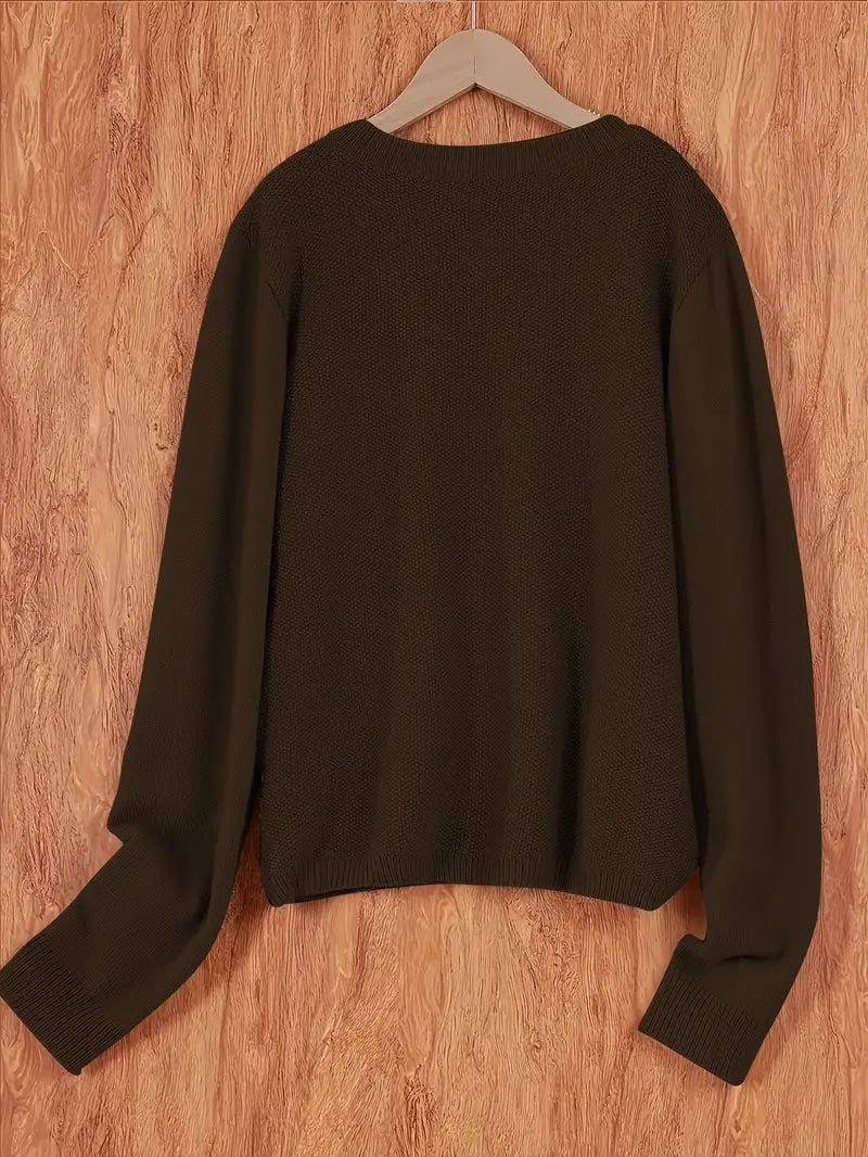 Comfortable women's cardigan in a cozy knit, great for casual layering.