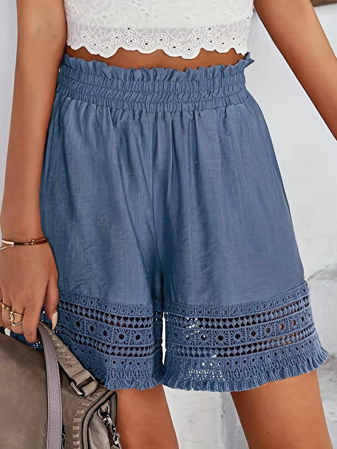 Stylish women's lace trim shorts with functional slant pockets, offering comfort & elegance for summer.