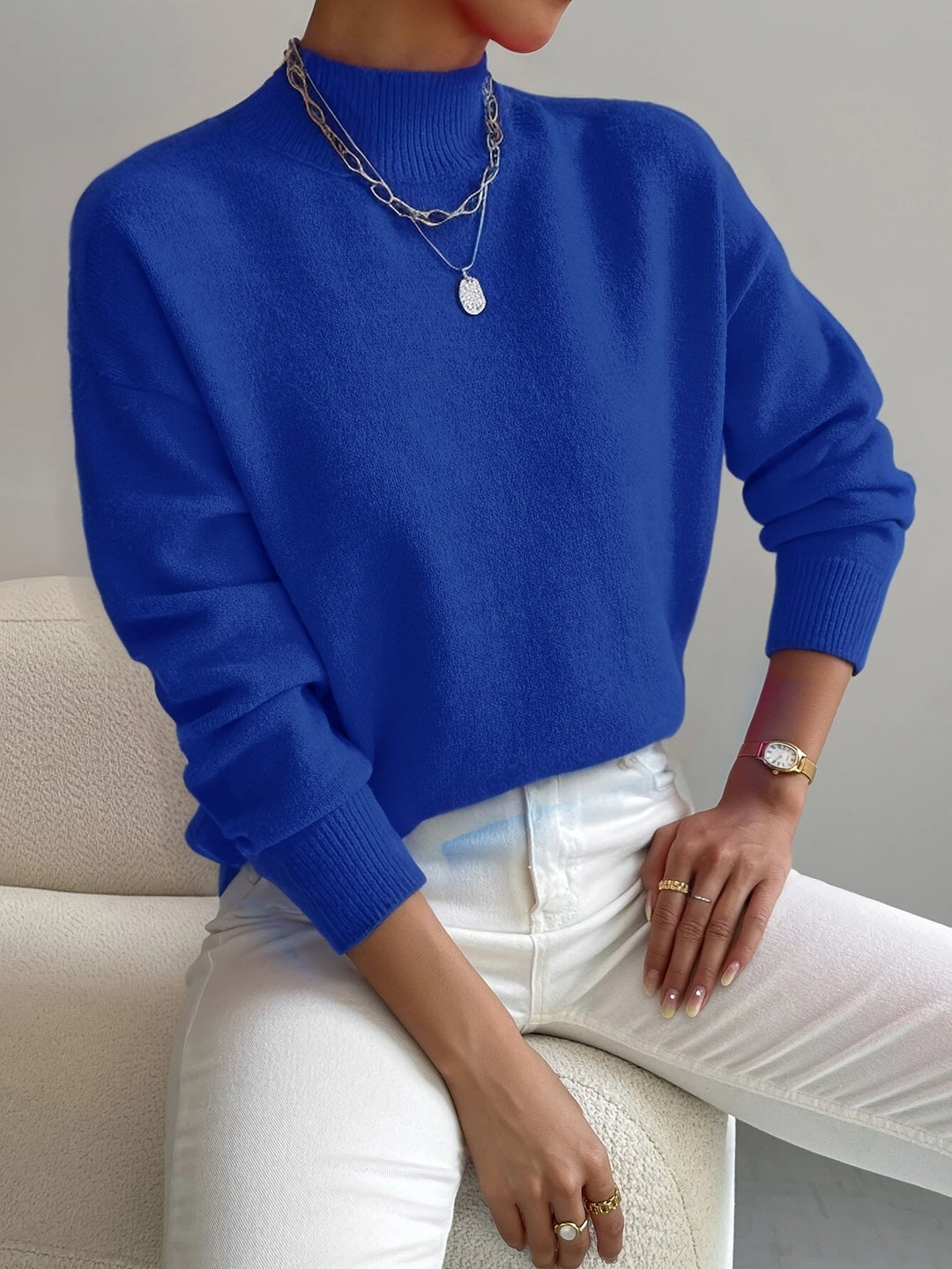 Soft knitted long sleeve pullover, essential women's autumn/winter clothing.