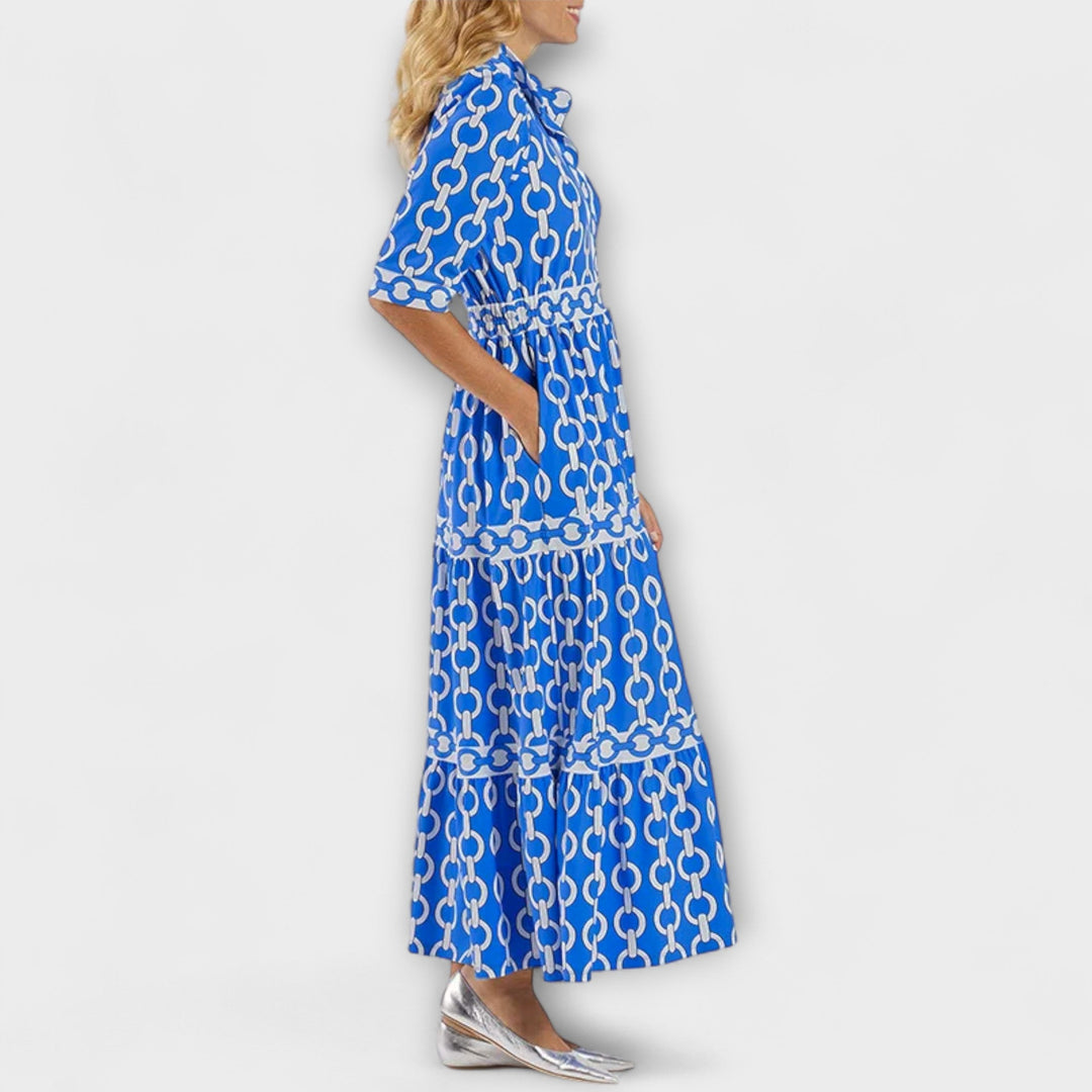 Versatile women's collared midi dress in a striking chain print. Ideal for both casual and formal settings.
