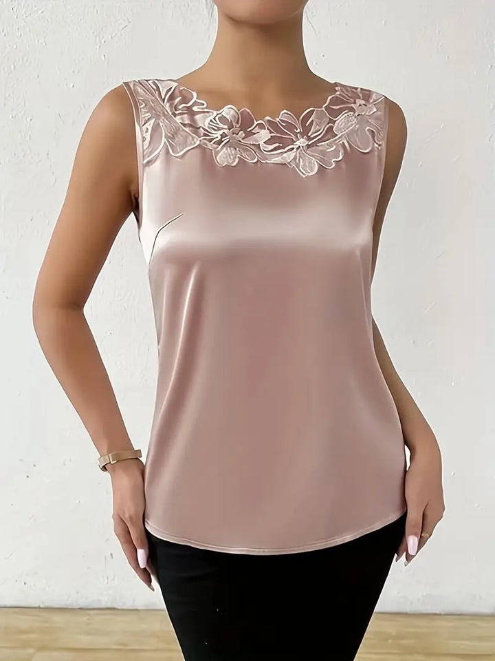Women's elegant floral blouse, versatile long-sleeve top for chic everyday wear or office attire.
