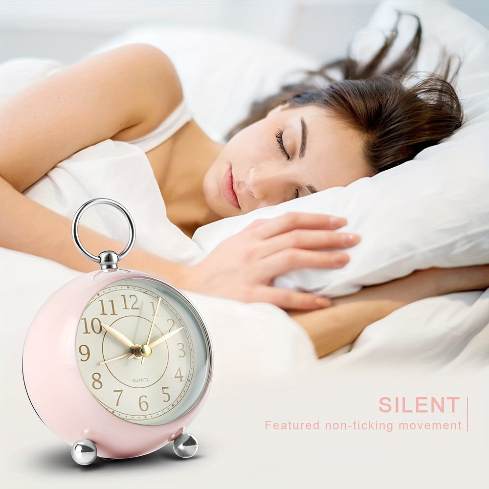 Retro light green analogue alarm clock, battery operated, quiet, clearly readable, with night light.