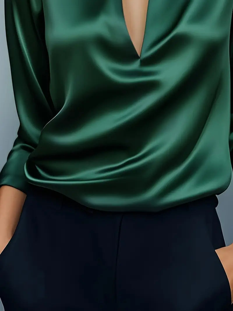 Polished women's long sleeve V-neck top. Collared blouse, ideal for professional office or chic casual wear.