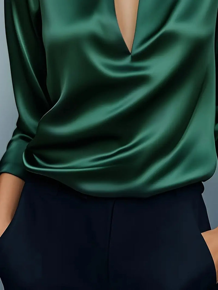 Polished women's long sleeve V-neck top. Collared blouse, ideal for professional office or chic casual wear.