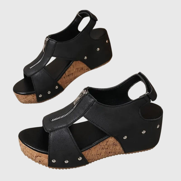 Stylish women's comfort sandals featuring orthopaedic design, wide fit, arch support, and easy zipper.